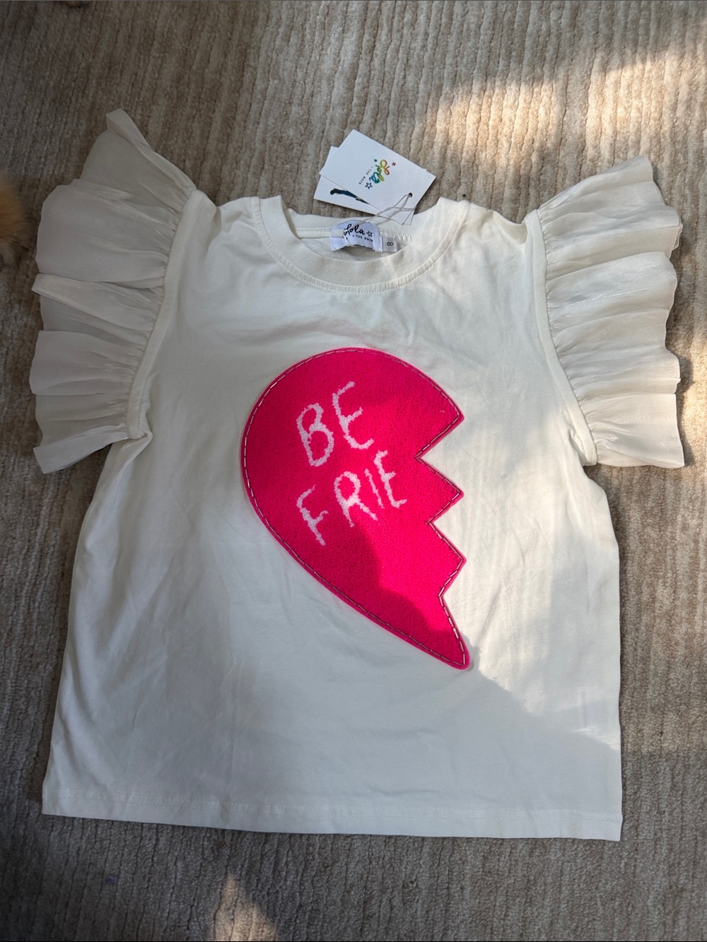 Lola + The Boys Cream Ruffle Sleeve Tee with Hot Pink 'Be Frie' Heart